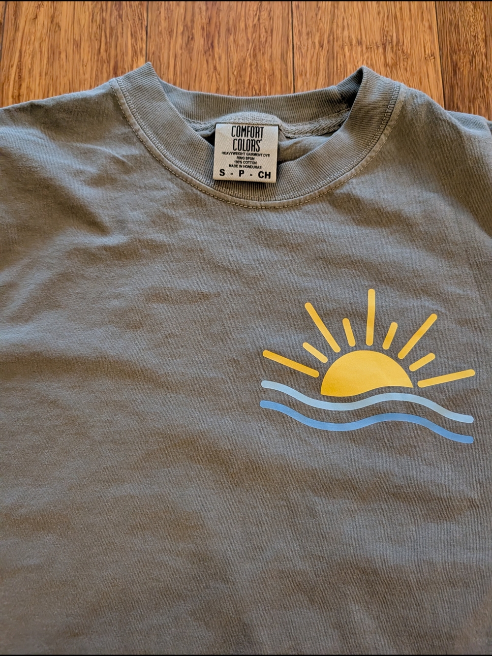 Graphic Sun & Waves Tee in Olive Green